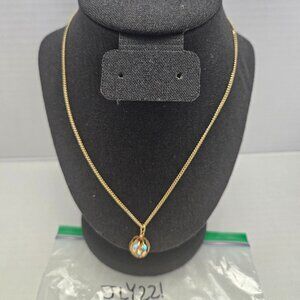 GOLD TONED NECKLACE WITH GEM FILLED SPHERE